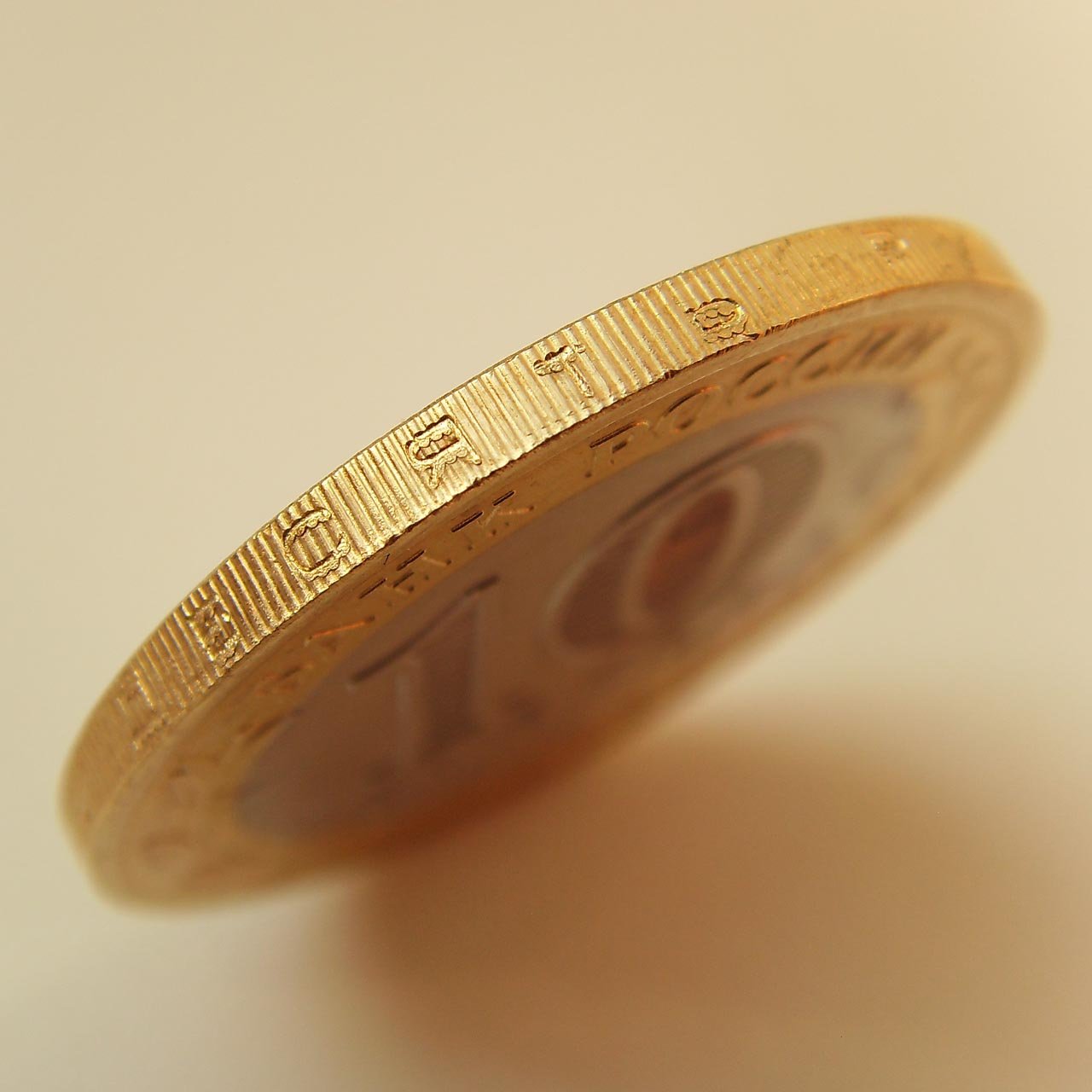 http://www.wheeclamp.ru/assets/images/russian_coins/10r_gurt.jpg